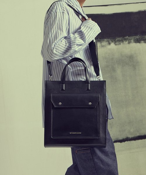 톱스티치 레더 포켓 토트백 _ 블랙